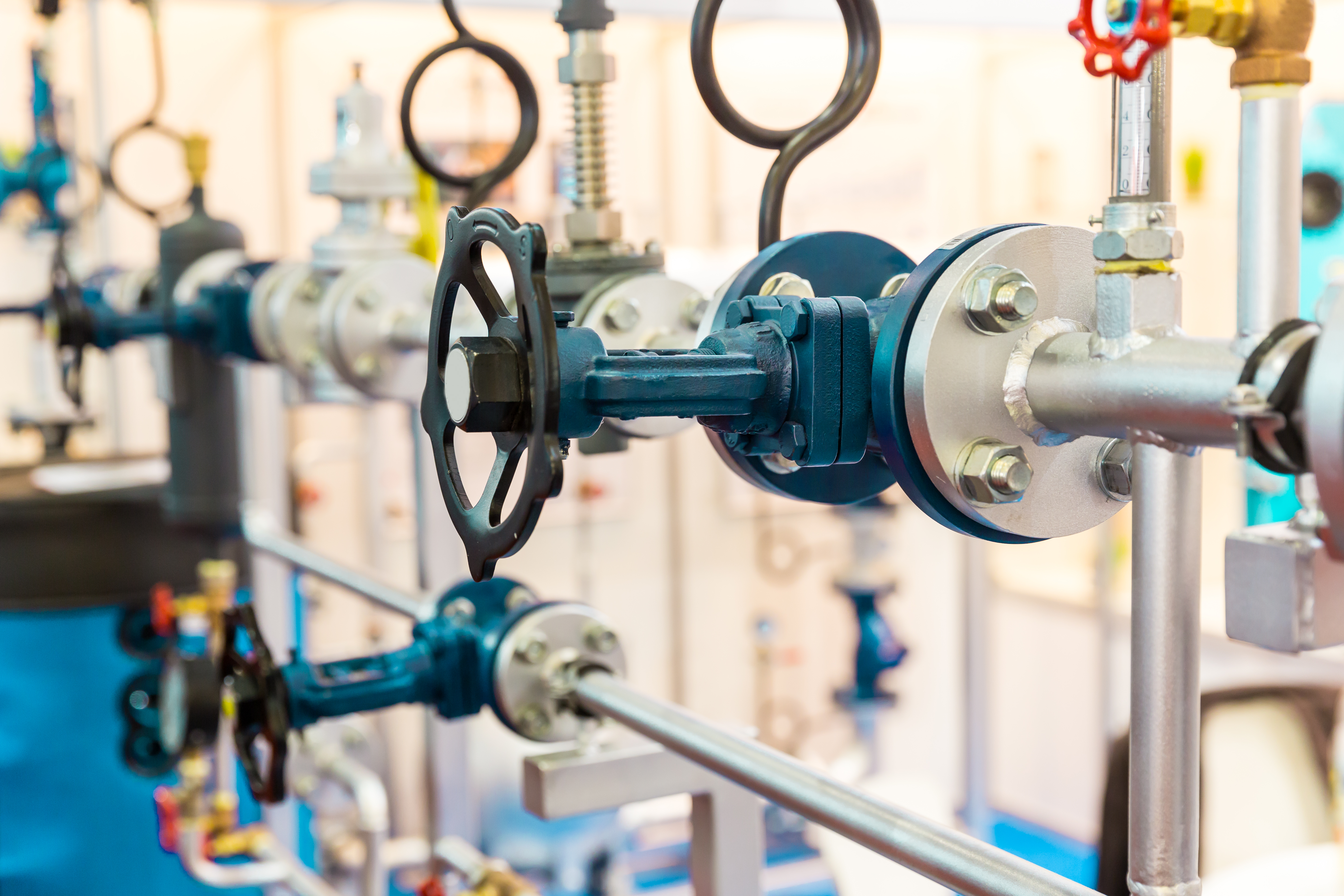 Close-up of a gate valve and industrial piping